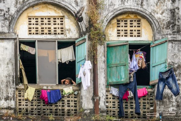 Myanmar, Birmanie, Yangon, Rangoon, boy at the window